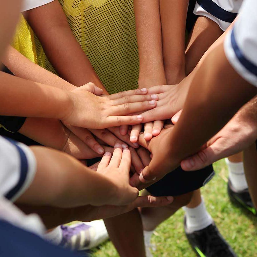 group of young people's hands